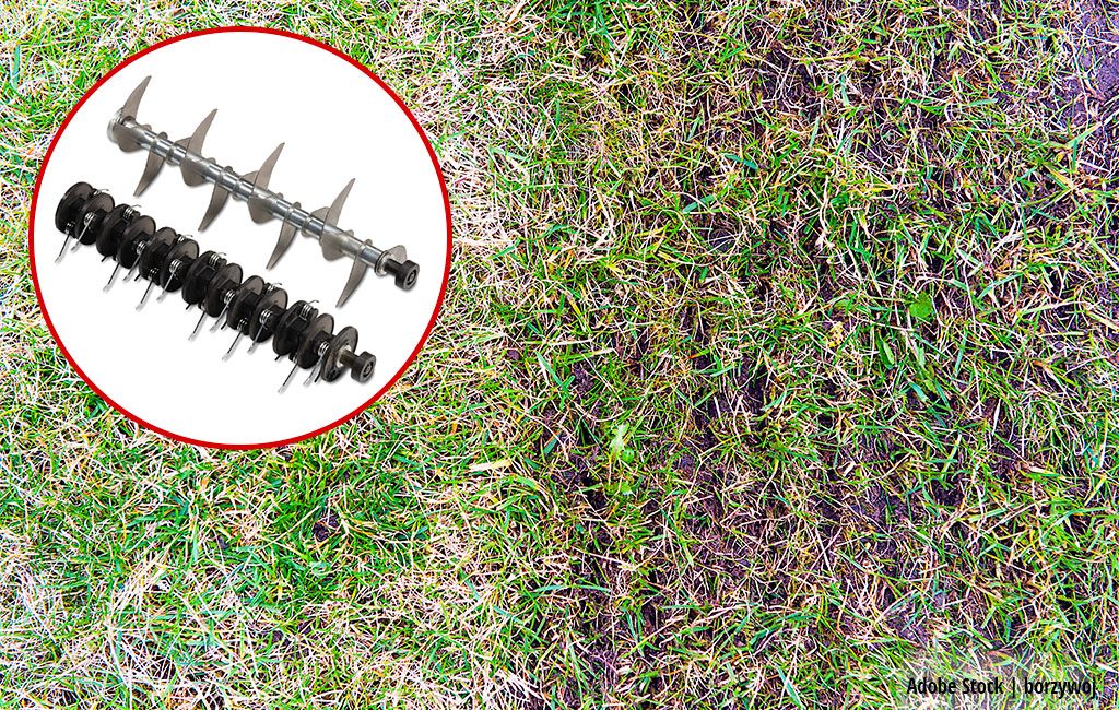 A blade roller and an aerator roller of a scarifier-aerator in front of a half scarified lawn.